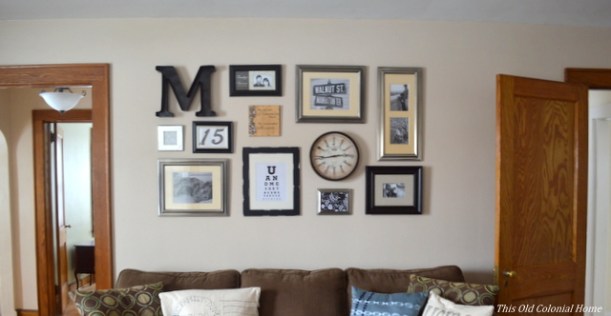 Gallery wall behind couch in living room 