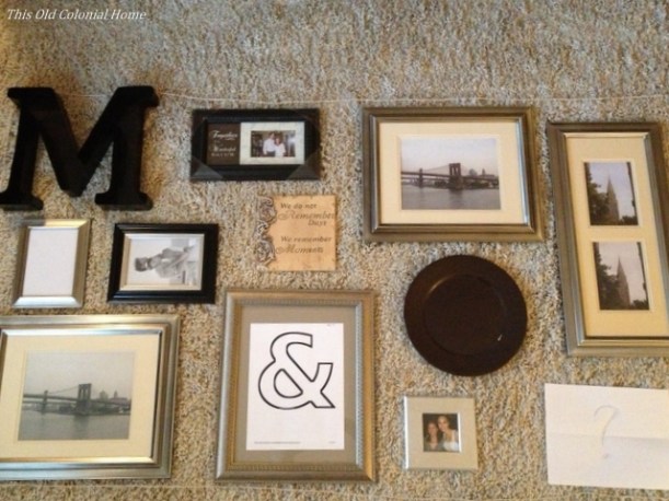 lay gallery wall pieces on floor to rearrange 