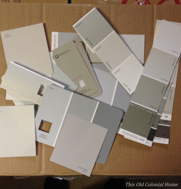 Pile of gray paint card samples 