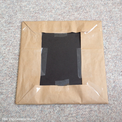 Frame backing wrapped like a present 