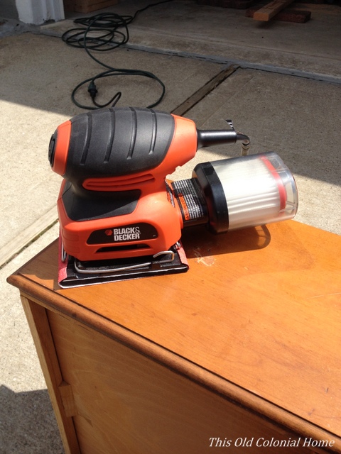 Using electric sander on drawers