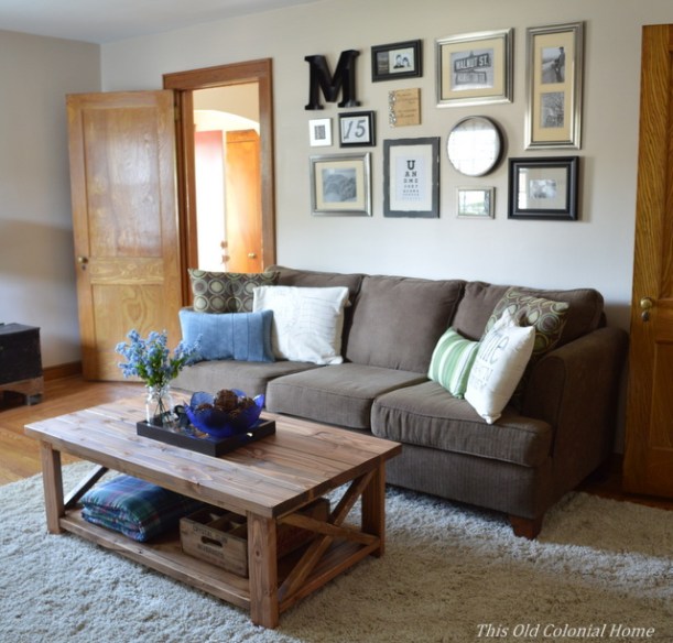 DIY wood coffee table and gallery wall in living room  