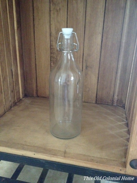 clear glass bottle with stopper 