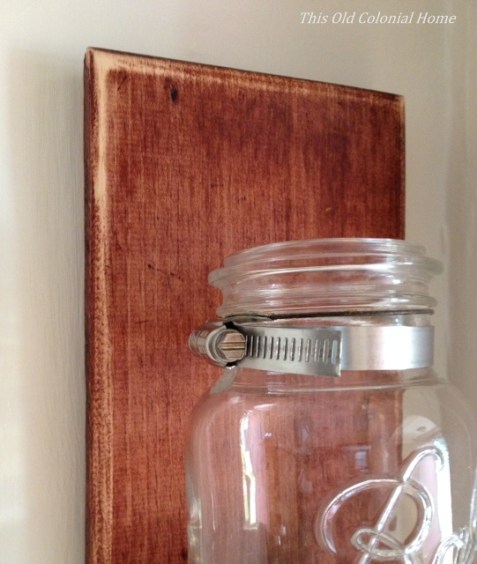 Nail pipe clamp to wood