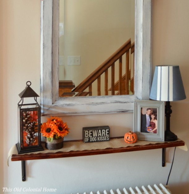 Fall shelf scape using pops of orange