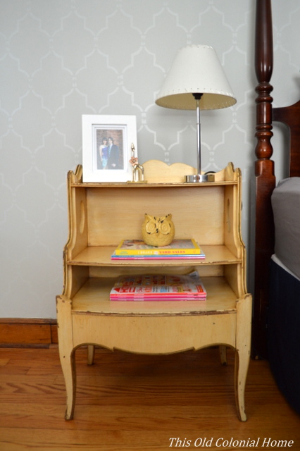 Yellow distressed nightstand found at garage sale