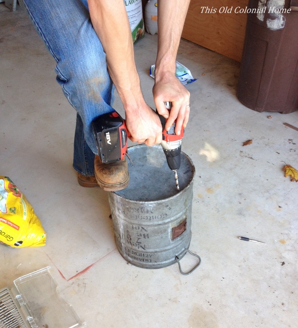 Drill holes in bucket for planter
