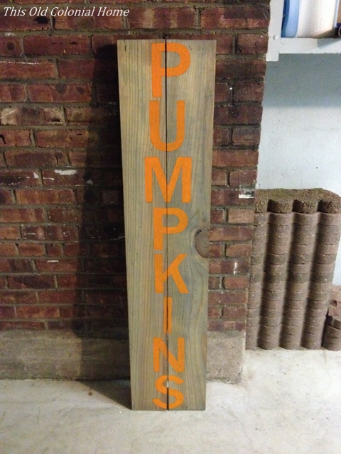 Pumpkin letters painted in orange
