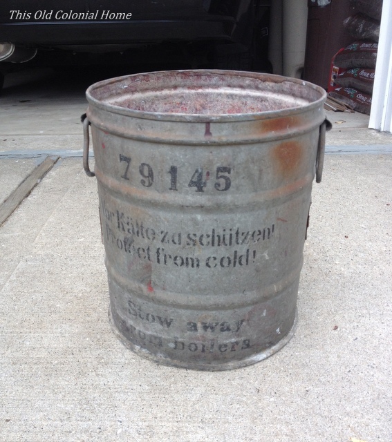 Rusty bucket with German writing 