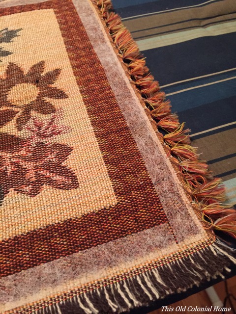 Line stitch witchery around edges of placemat